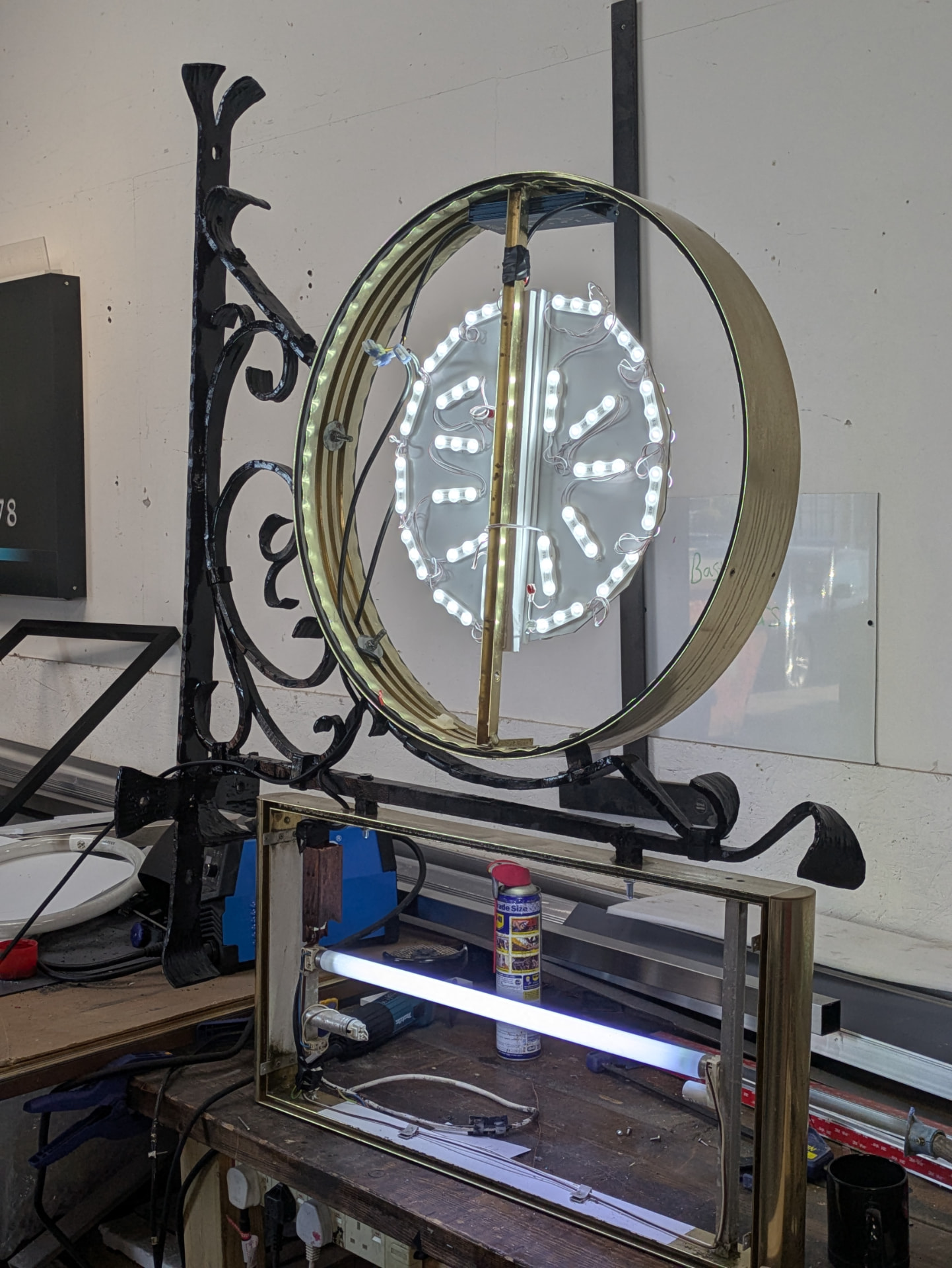Restored projection sign illuminated during workshop testing