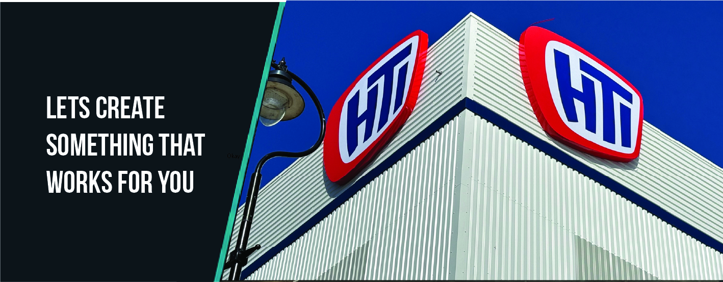 HTi illuminated 3D fabricated logo signage on commercial building by TCB Signage